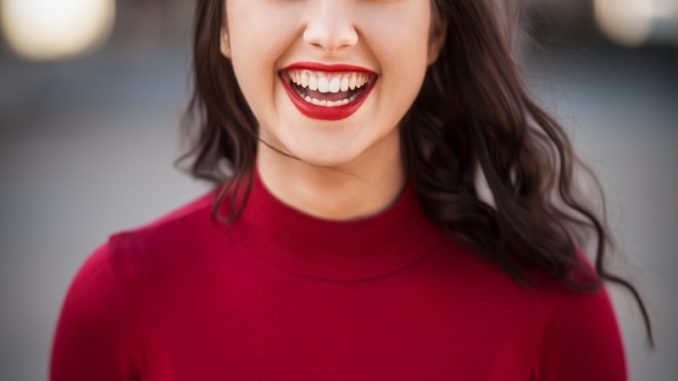 closeup photography of woman smiling